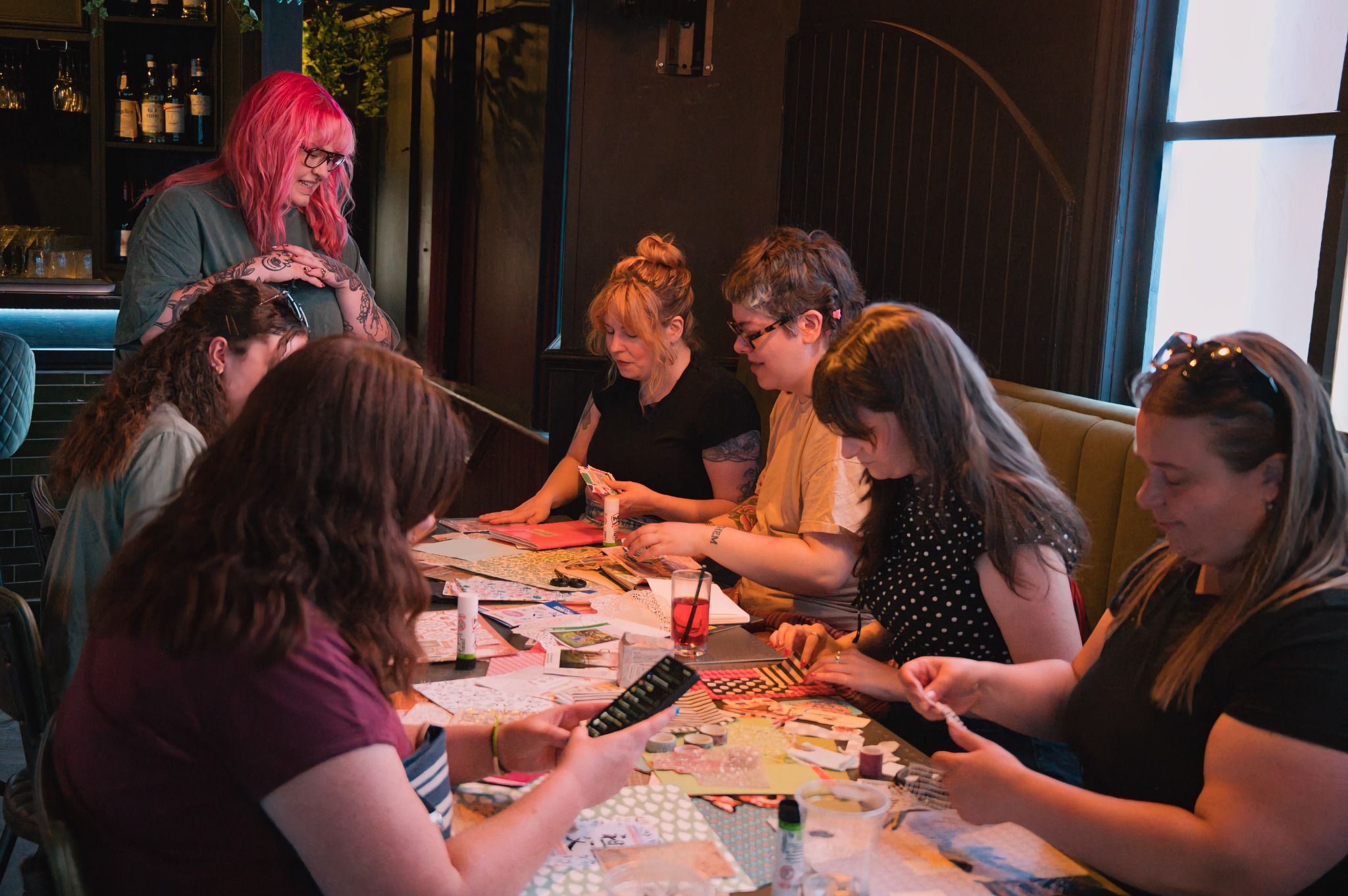 People enjoying a creative workshop together